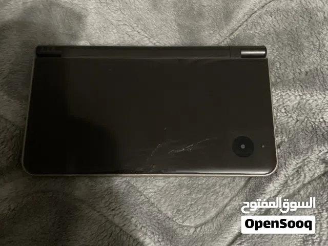 Nintendo DSi XL بحالة ممتازة نينتندو من مع شاحن و ذاكرة العاب