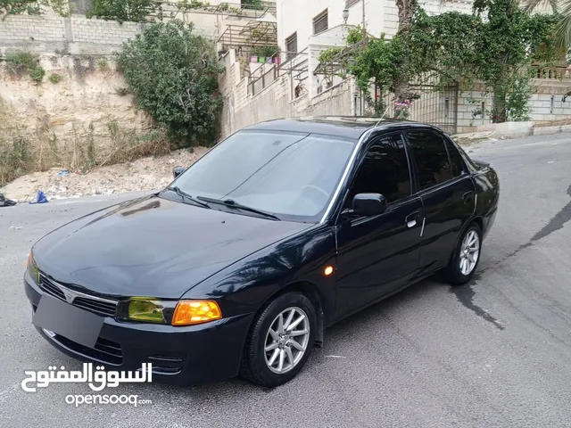 متسوبيشي لانسر 97 اتوماتيك اصلي بسعر مغري