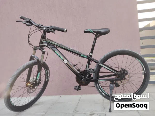 The brand of the bicycle is GMINDI. The tires are made by the brand CST.
