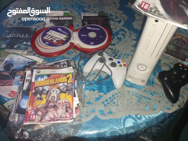 x box 360 deux manettes et 46 jeux