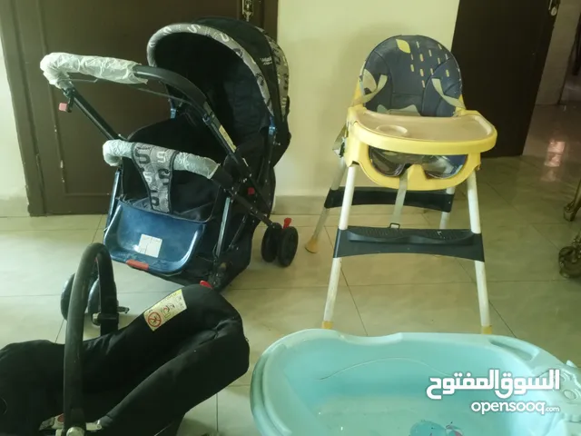مستلزمات اطفال( عرباية وكرسي طعام كوت وبانيو حمام)