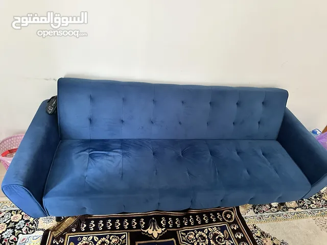 A very clean 3-person sofa used only for two months and a bed at the same time.