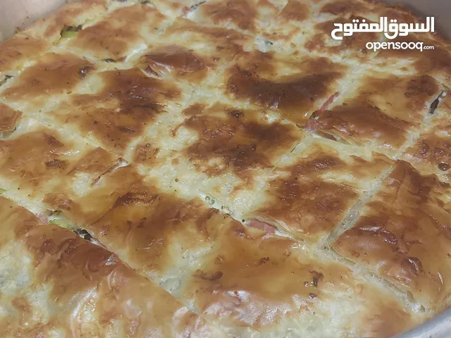 صنية رقاق محشى جبنه و زيتون طعم فوق الممتاذ