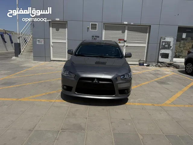 مستبيشي لانسر موديل 2014 مثبت سرعه قير عادي جنوط جداد سياره جاهزه قابل للتفاوض