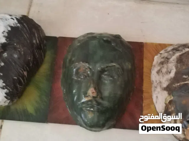 مجسمات وجوه ديكور من الفخار الشغل اليدوي