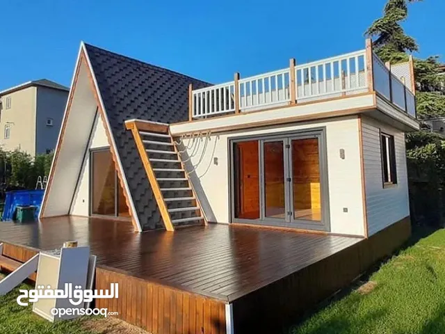 کوخ خشبي بمساحة ۵۲ متر مربع