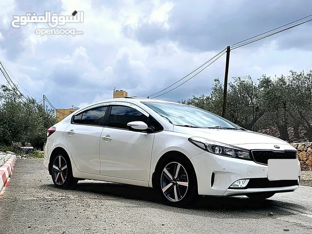 كيا سيراتو K3 ماتور 1600 بنزين اصل شركة مع فتحة سقف