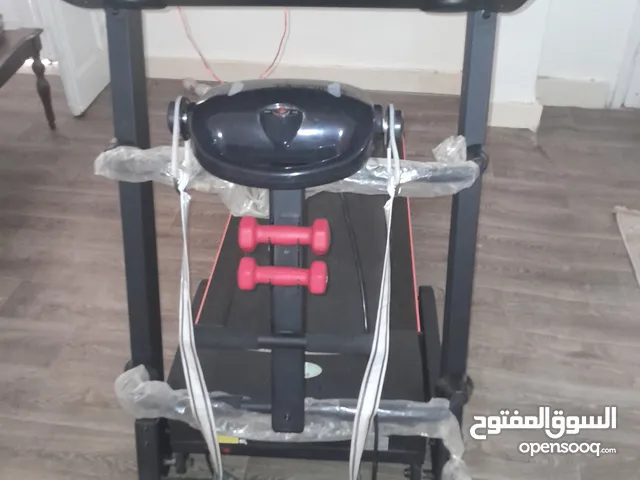 جهاز مشي شبه جديد يشيل وزن 120 كيلو ومعاه جهاز تدليك ومعاه وزن 1كيلو