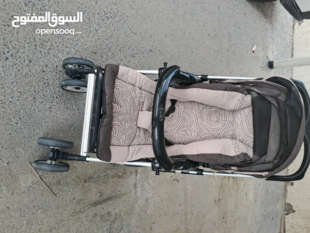 عربة أطفال شبه جديد