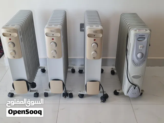 4 LARGE RADIATORS AS NEW.