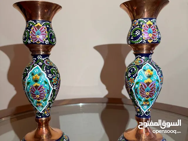 2X The enameled candlestick (20cm)