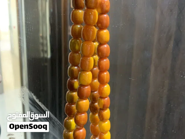 مسبحة مصنوعة من حجر الكهرمان الطبيعي