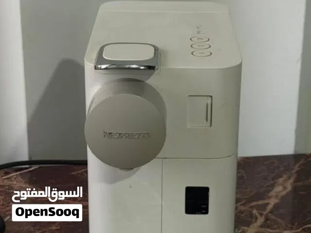 ماكنه قهوه منnespresso شغاله ميه بالميه