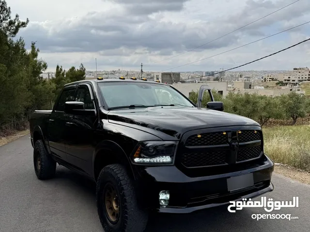 DODGE RAM 2018 big horn sport package 5.7 رام 2018 3 جيد فل ما عدا الفتحة و جحش الوسط