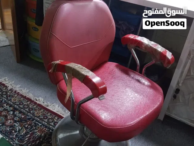 كرسي حلاقة نسائي أحمر