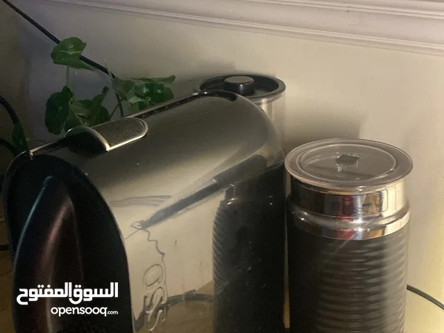 جهاز نسبريسو قهوة مستعمل مع جهاز تبخير حليب