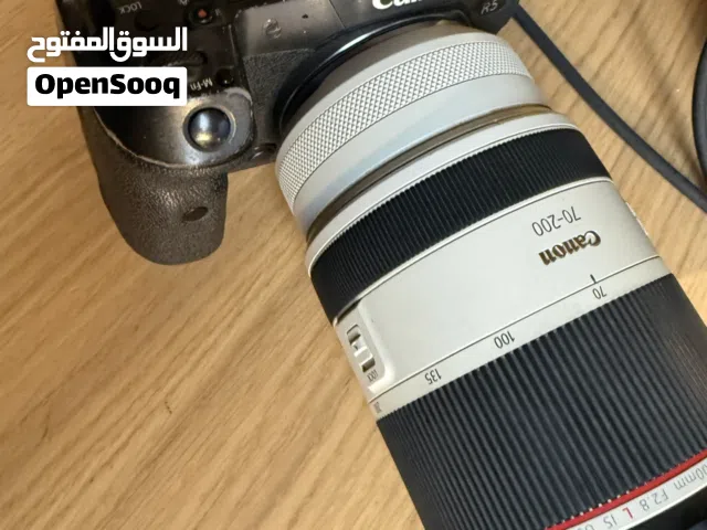 Canon EOS R5 mirrorless camera body along with a Canon 70-200mm lens