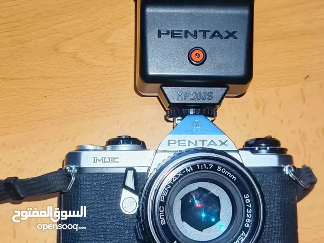 كاميرا pentax مع عدسات عدد 4 ويد تحكم حالة جيدا جدا