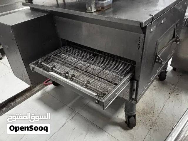 Pizza oven conveyor made by Marshall USA and overhall and service by agent Dish washer Fagor Spain