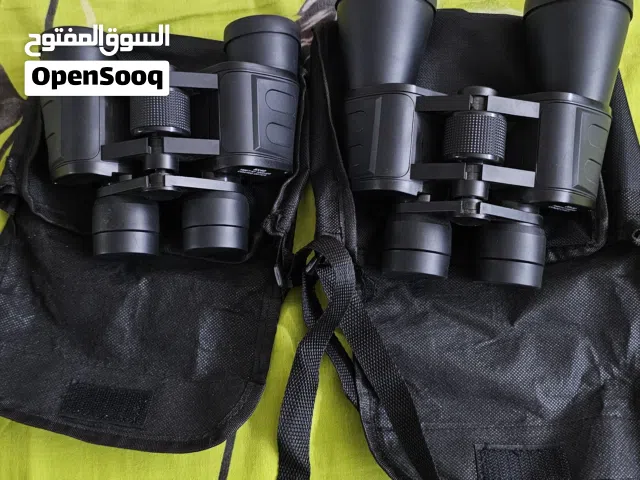 High zoom binoculars