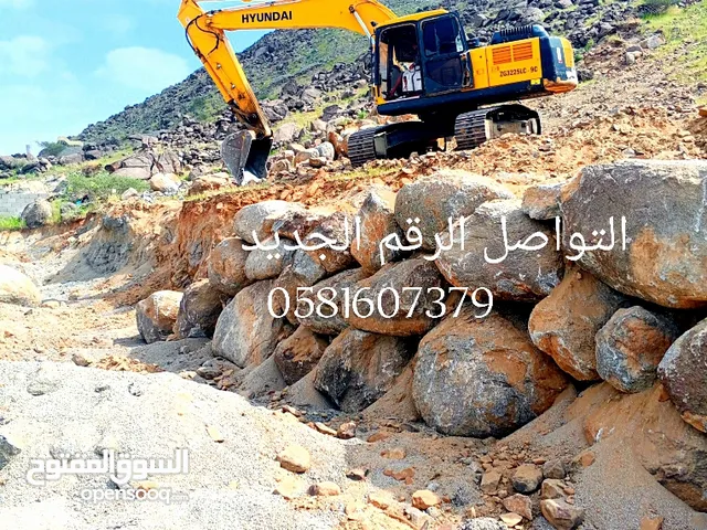 حفار بوكلين للايجار وبناءالحجر رابراب ومصدات لسيل وممرات وبناءبالبوكلين