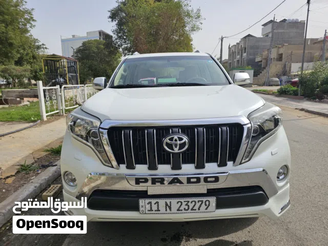 تويوتا برادو خليجي ابيض اللون مكفولة موديل 2014 ماشية 114كم موقع / بغداد الشالجية مواصفات TXL