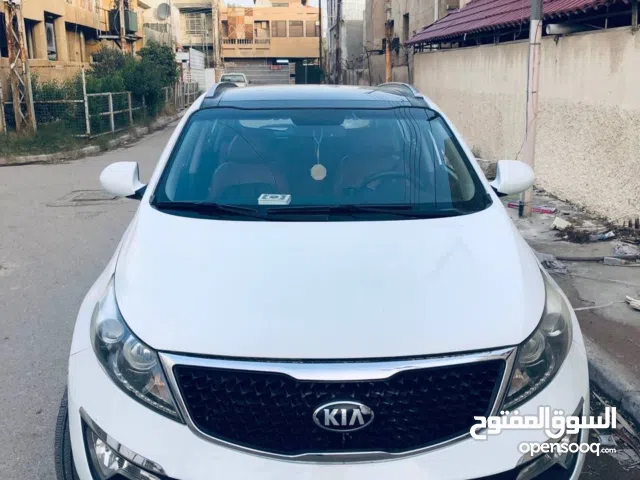 كيا سبورتج ابيضّ بانوراما فتحة مواصفات خليجية محرك 2000 دوش بنزين تبريد تدفئة كير ومحرك ممتاز