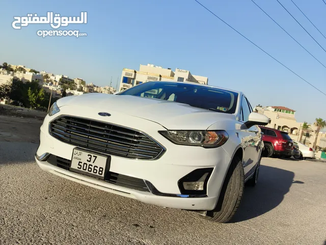فورد فيوجن 2019 - مواصفات خاصة - بداخلية حمراء مميزة للبيع - ممشى 99 الف كيلو - 2 جيد