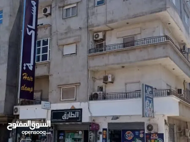 عمارة بالشارع الرئيسي مقابل حلواني بوعشرين