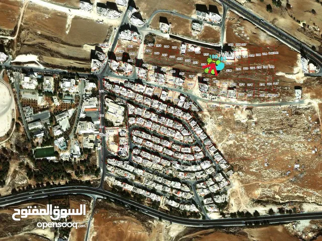 ارض من اراضي شمال عمان ياجوز واجهه على الشارع للبيع