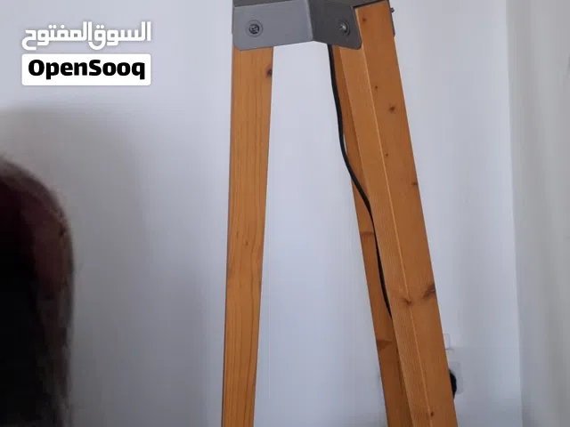 floor lamp with small round table attached