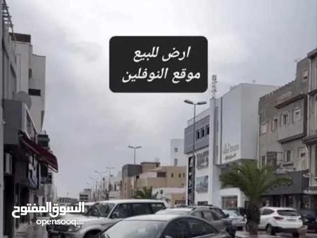 ارض لبيع 114 متر واجهتين