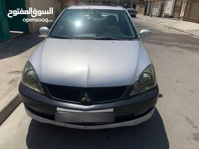 مكلف بالنشر رقم صاحب السياره بالتفاصيل لانسر 2007 خليجي