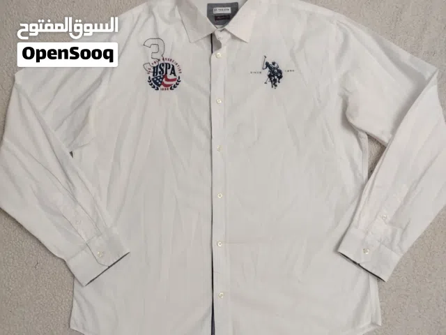 قميص polo قياس شبه جديد