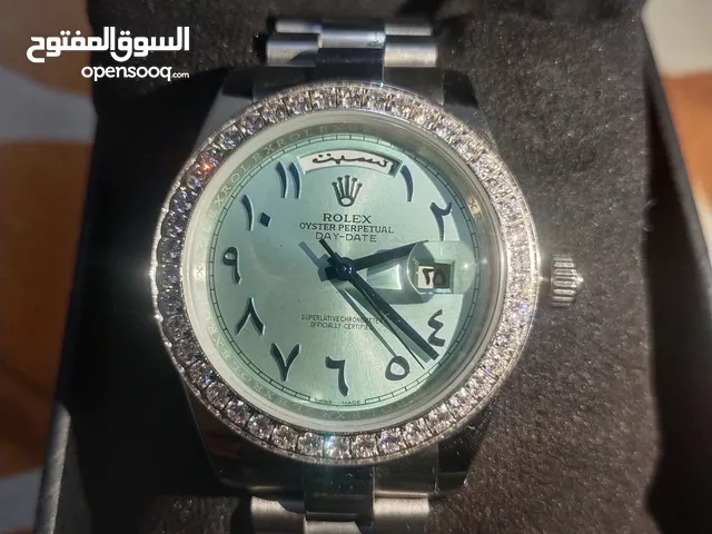 Rolex Day date Blue Arabic dial diamond bezel Automatic