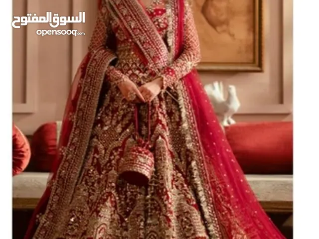 Wedding dress from ZEVK in dark red