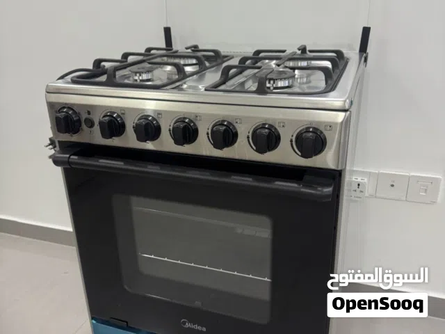طباخ ماركة Mida اربع عيون60سم شغال نظيف جدا مستعمل شهرين فقط ناار عالية