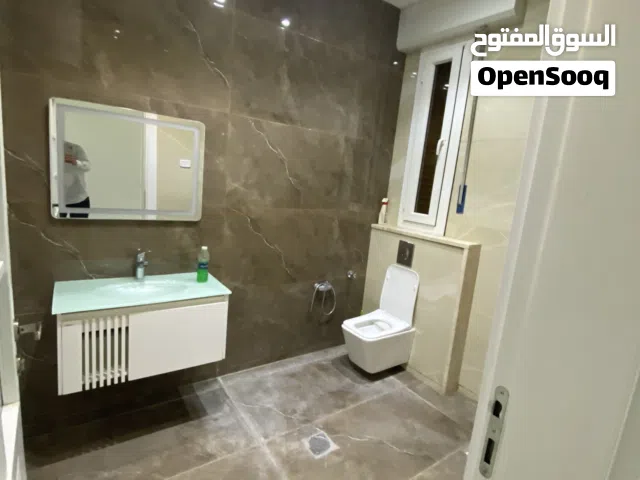 شقة ارضية بناء حديث للإيجار السراج شارع البغدادي