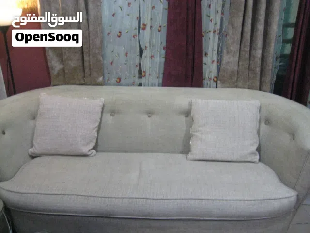 beige three piece sofa for sale