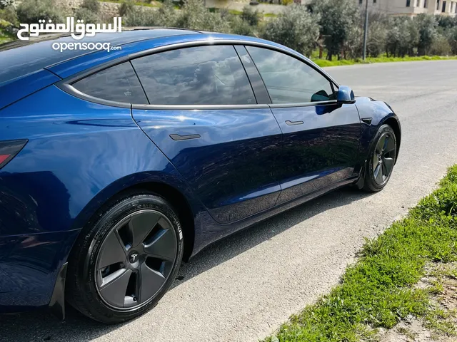 Tesla model 3 dark blue