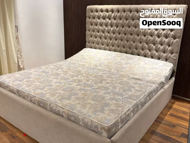 Elegant Upholstered Bed with Unique  Headboard and Mattress