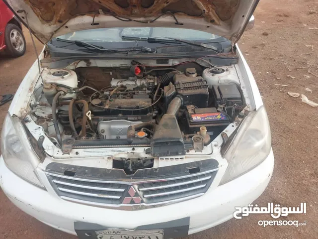 للبيييييع لانسر بومه موديل 2007 مومنه قير عادي شغاله فل بنزين المكان المناقل رفاعه للطلب والا