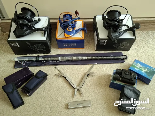 ماكينة / بكرة صيد سمك / قصبة صيد سمك