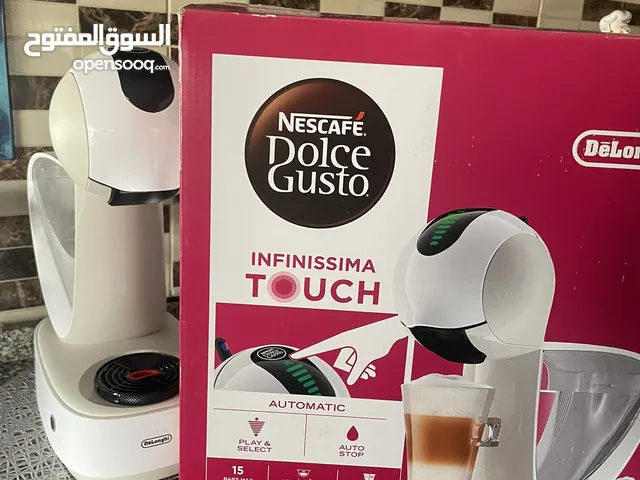 ماكينة تصنيع القهوة dolce gusto بسعر ممتاز  استعمال خفيف جدا touch حامي بارد