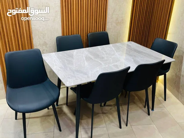 ميز طعام رجل حديد دوشمة جلد سطح مرمر مزجج