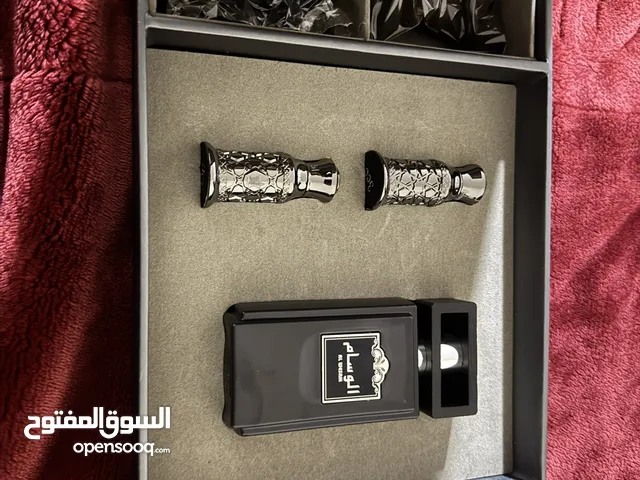 عطر شنطة الوسام من العربية للعود رجالي ونسائي بسعر حرق شبه جديد 65دينار