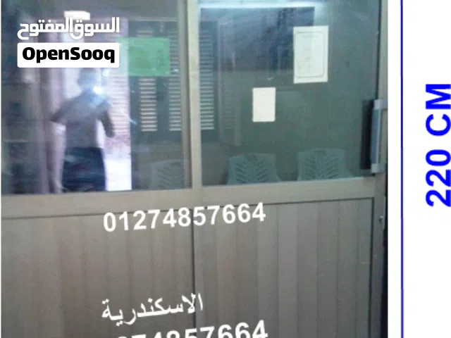 باب جرار ضلفتان زجاج فى مية مع تجاليد