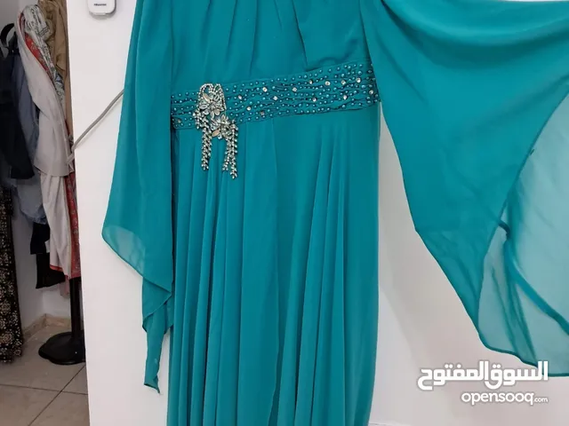 فستان تركواز ثقيل بحاله ممتازه
