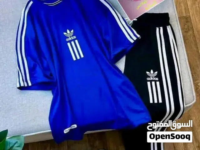 ملابس طقم نسائي