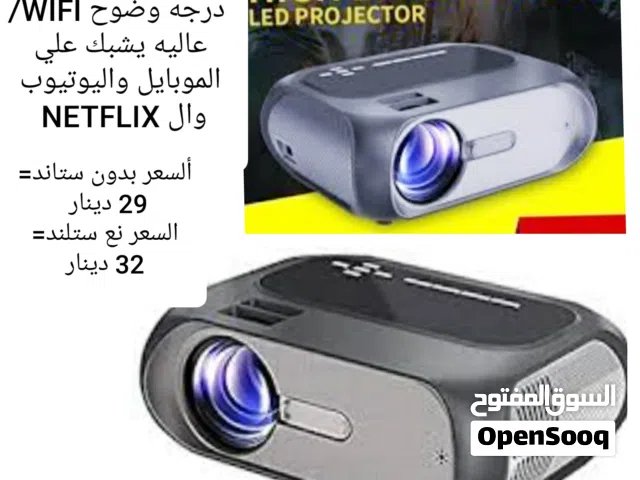 بروجكتر شحن 4K جديد SMART +WIFI +YOUTUBE +NETFLIX يشبك علي النت والموبايل بحجم الموبايل بسعر التصفيه